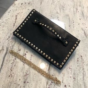 Women’s black clutch